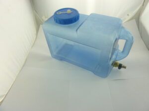 Coolant tank incl. cock